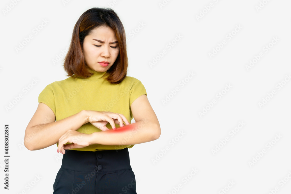 Asian woman scratching her itchy arm cause of dry skin, food and drugs allergies ,dermatitis , skin problem concept Asian woman scratching her itchy arm cause of dry skin, food and drugs allergies ,dermatitis , skin problem concept
