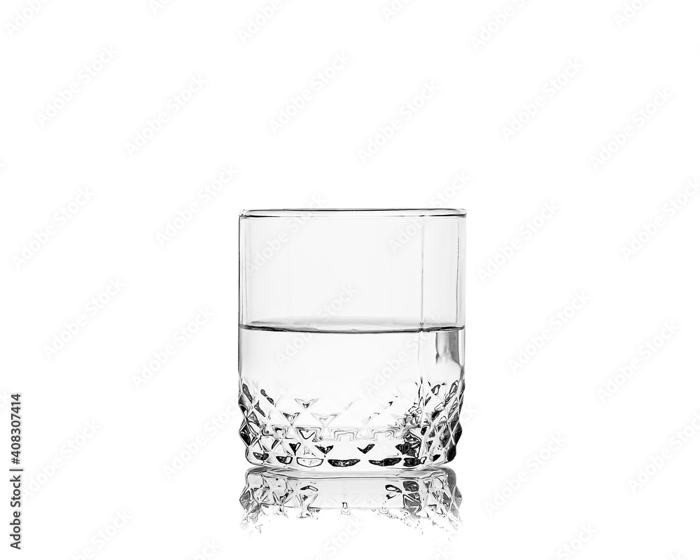 Whiskey glass with transparent liquid isolated on white background Whiskey glass with transparent liquid isolated on white background