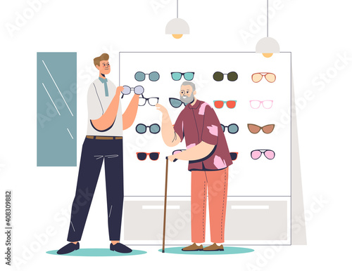 Senior man choosing glasses in optics store. Consultant helping older male to buy eyeglasses