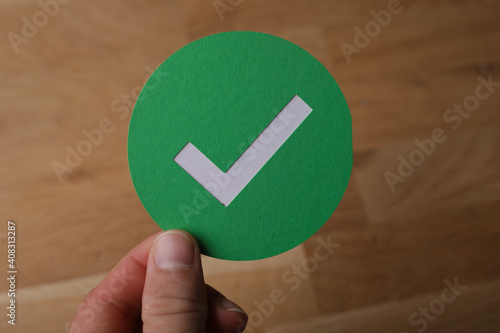 check mark on hand