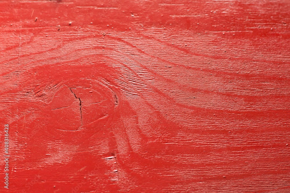 Red painted wood. The background photo.