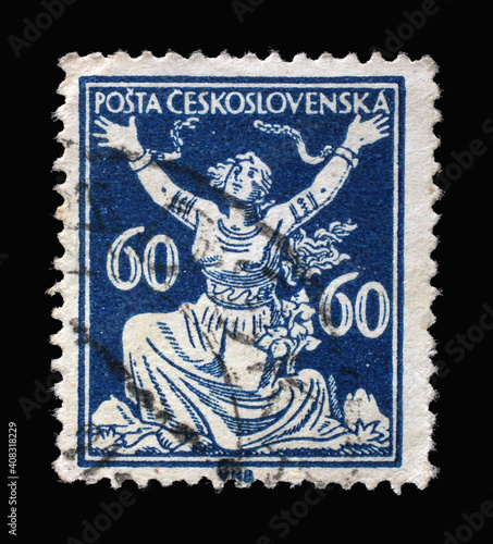 Stamp printed in Czechoslovakia shows Breaking Chains to Freedom, Series Allegory of Republic, circa 1920