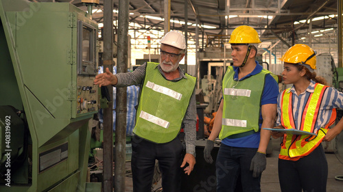 Team Of Engineers Having Discussion