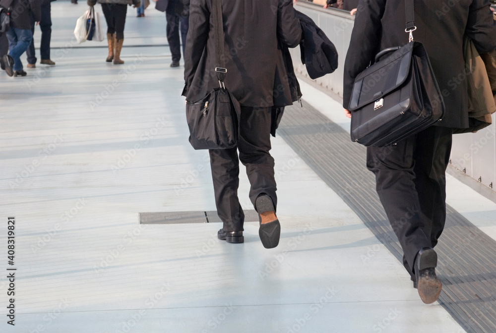 walking commuters at the airport walking commuters at the airport