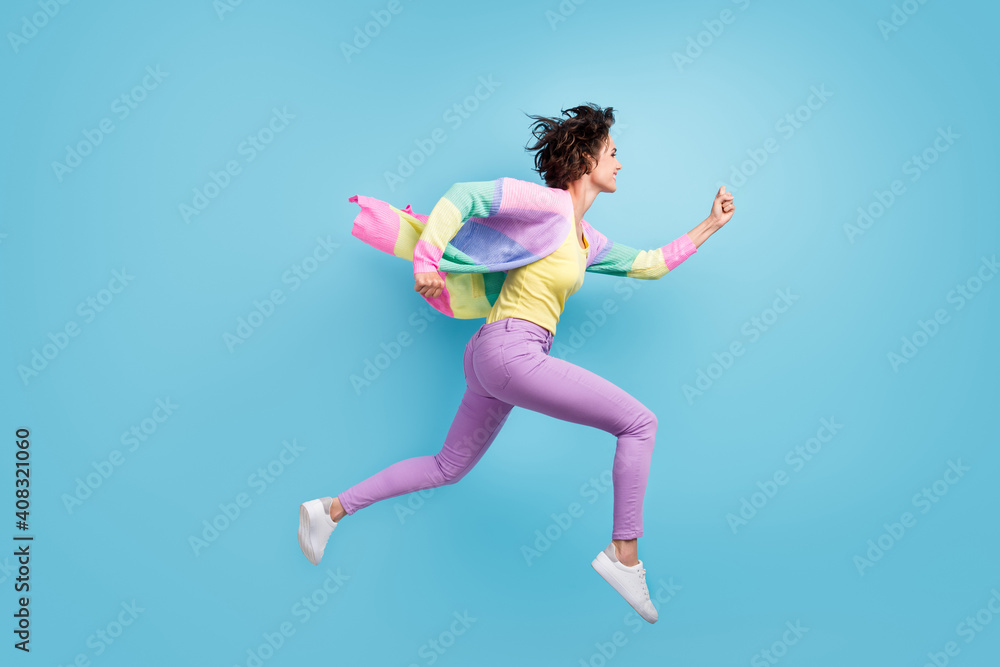 Photo portrait profile full body view of running woman isolated on pastel blue colored background