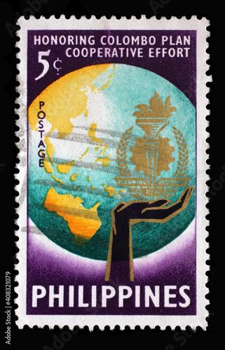 Stamp printed in Philippines shows Colombo Plan Badge and Globe, Series: 7th Anniversary of Joining the Colombo-Plan, circa 1961.