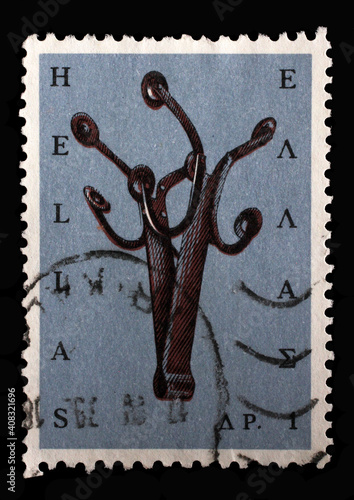 Stamp printed in Greece shows Massia (percussion instrument), Greek Popular Art, circa 1966 photo