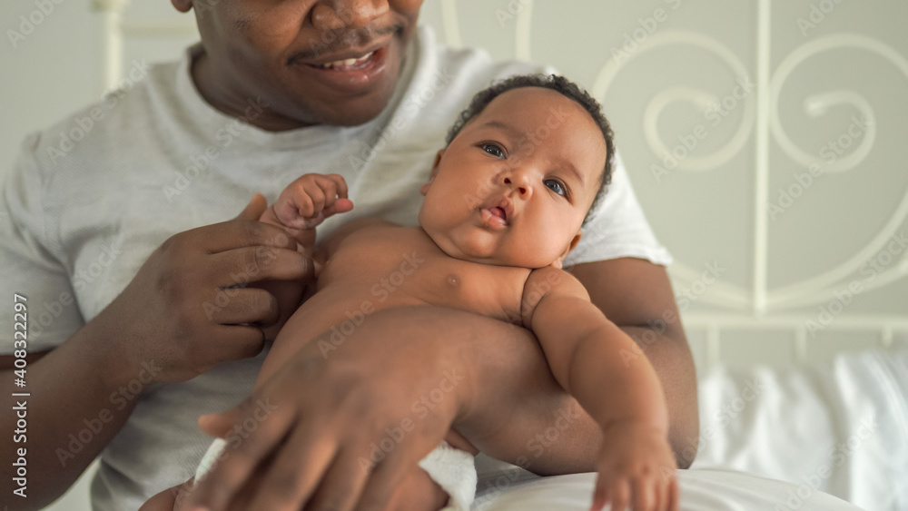 African man with his little baby African man with his little baby