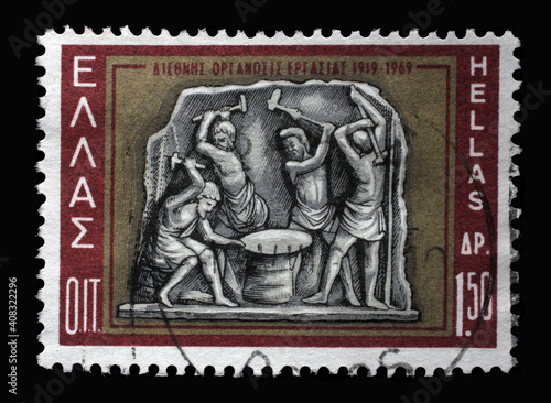 Stamp printed in Greece shows Hephaestus and Cyclops, circa 1969 © zatletic