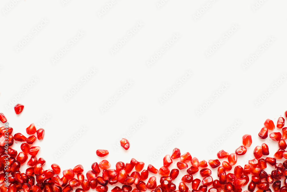 pomegranate seeds on white background, color background pomegranate seeds on white background, color background