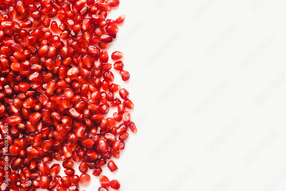 pomegranate seeds on white background, color background pomegranate seeds on white background, color background