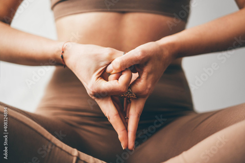 Closeup woman hand in mudra gesture practice yoga.