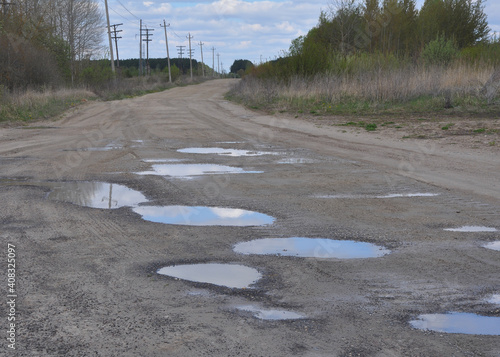 Dirt road in Belarus goes into the distance