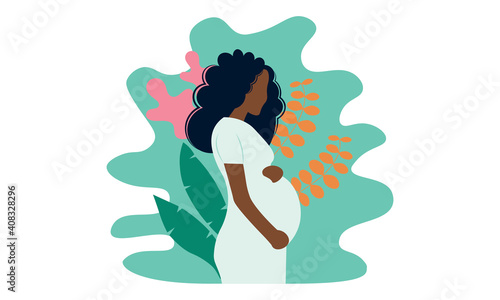Young beautiful pregnant black woman in nature. Concept for pregnancy, motherhood.