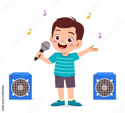 little boy sing a beautiful song on stage