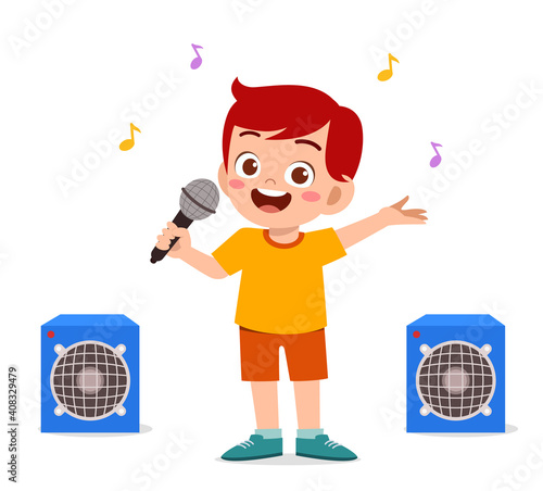 little boy sing a beautiful song on stage