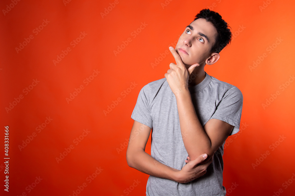 The man is holding his head. Headache and migraine. Problems and emotions. The man is holding his head. Headache and migraine. Problems and emotions.