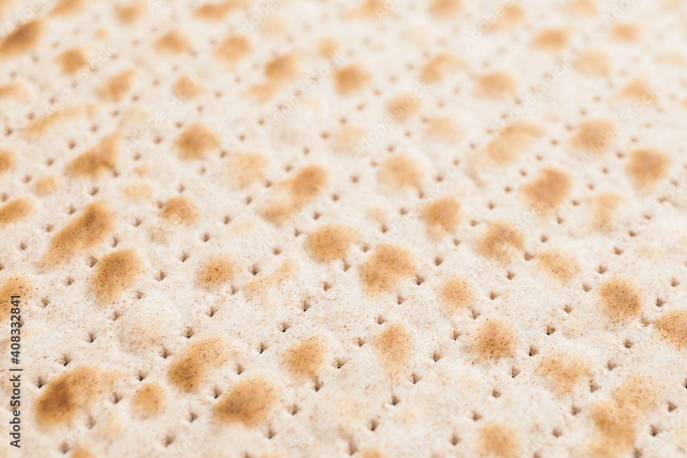 Jewish flatbread matza for Passover as background