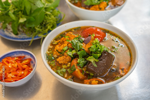Vietnamese cuisine - tasty crab and tomato noodle, Bun Rieu