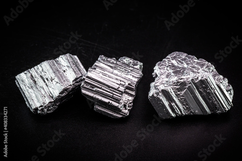 neodymium is a magnetic chemical element with the symbol Nd, in solid state. It is part of the rare earth group, used in the technology industry photo