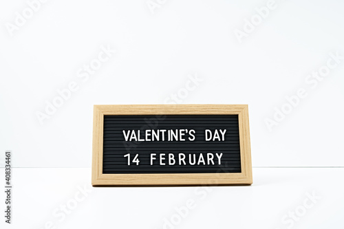 The inscription Valentine's Day in a frame on a white background. Copy space, mock up.