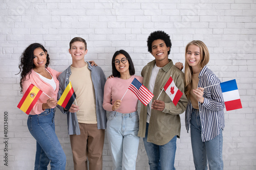 Immigrants of different countries and exchange students in language school photo