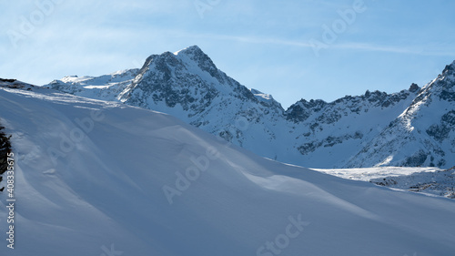 beautiful alpine landscape with fresh snow on a sunny day © Chamois huntress