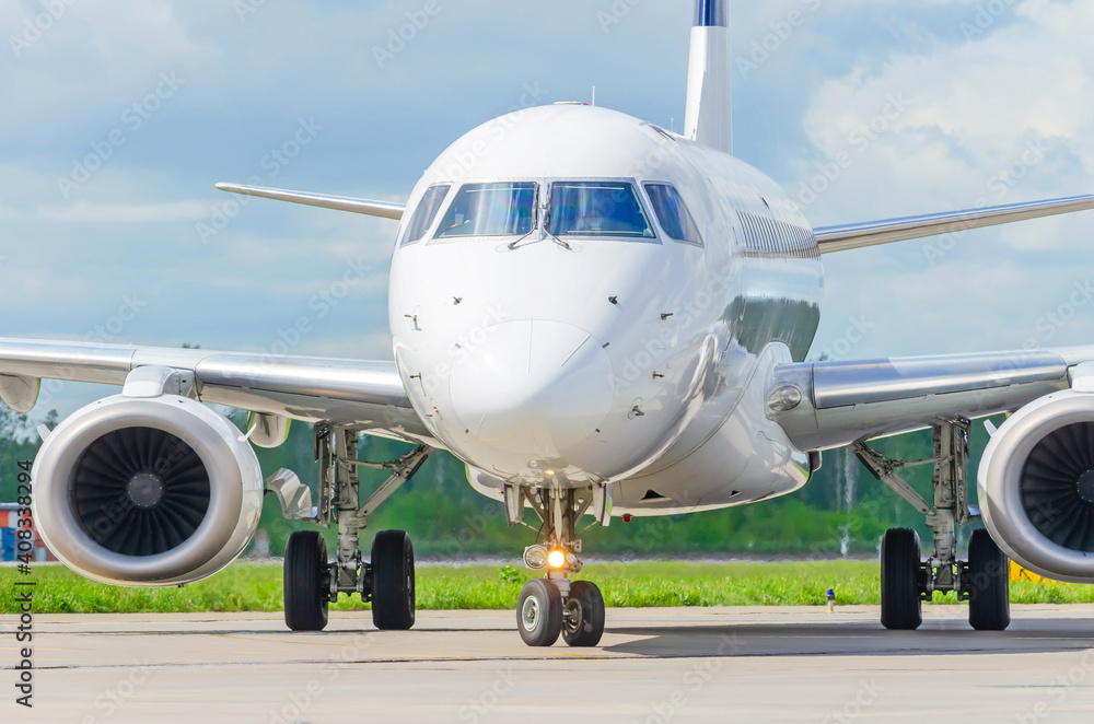 Airplane during taxiing and turning, view directly on the cockpit. Airplane during taxiing and turning, view directly on the cockpit.