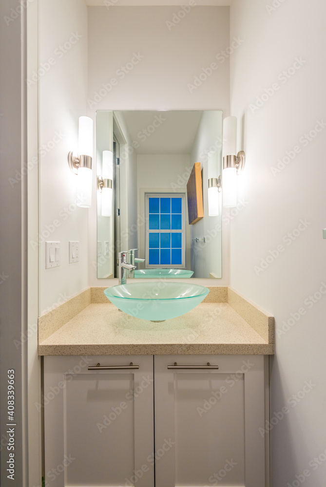 Fragment of a bright, clean bathroom in a luxury house. Fragment of a bright, clean bathroom in a luxury house.