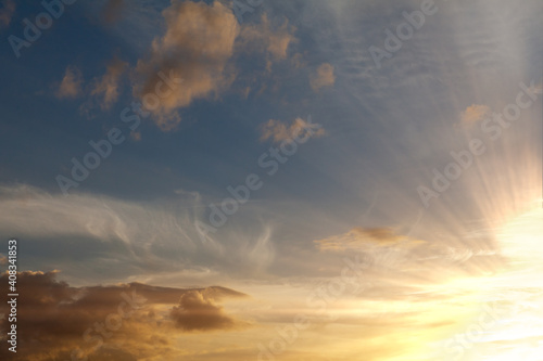 Amazing sunset and warm skies with clouds