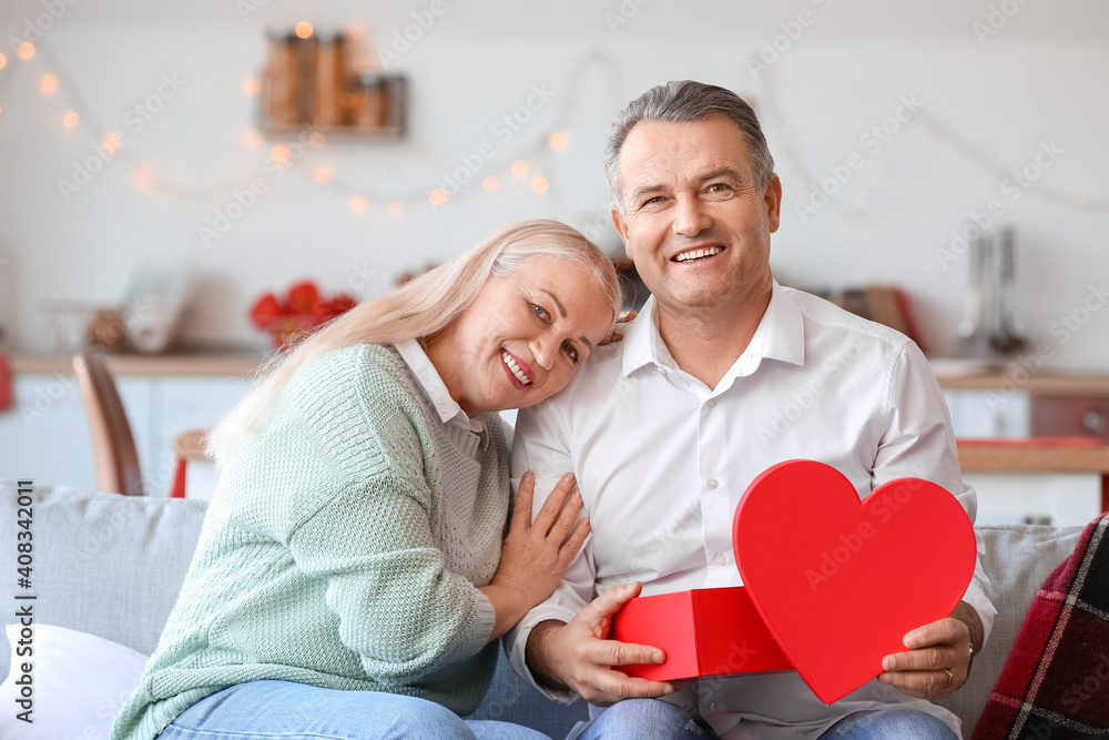 Mature couple celebrating Valentine's Day at home Mature couple celebrating Valentine's Day at home