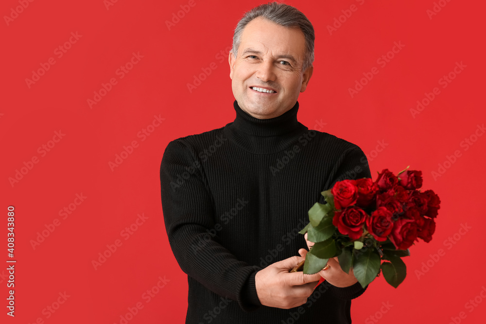 Mature man with bouquet of beautiful roses on color background Mature man with bouquet of beautiful roses on color background