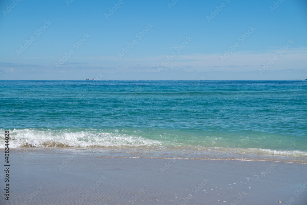 waves crashing at a beautiful blue beach in florida waves crashing at a beautiful blue beach in florida