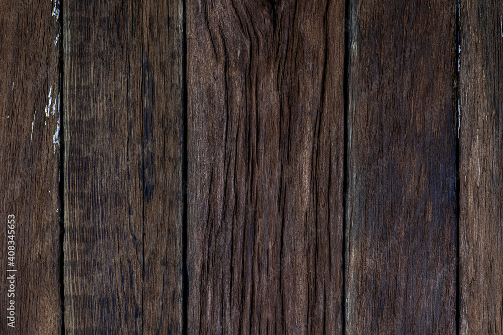 Panel from the old in cracks boards of brown color, made old in natural way. Panel from the old in cracks boards of brown color, made old in natural way.