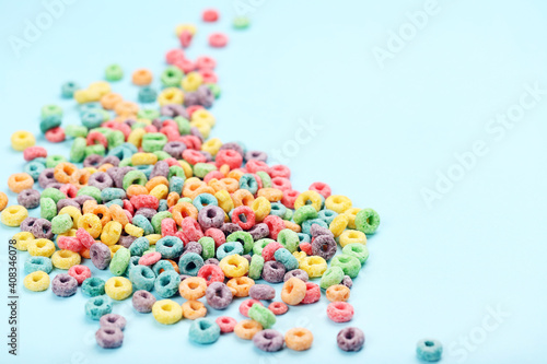 Colorful corn rings on blue background