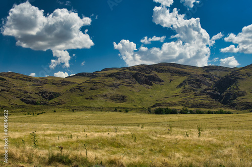  mountains landscape in Sierra de la Ventana area. Taken on a summer morning under able sky with a few white clouds    