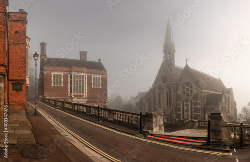 Harrow on the Hill in a foggy wintery morning, England  photo