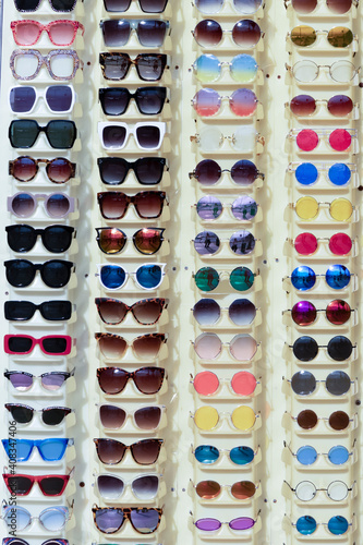 detail of sunglasses without brand name and logo at a shopping booth at Venice beach