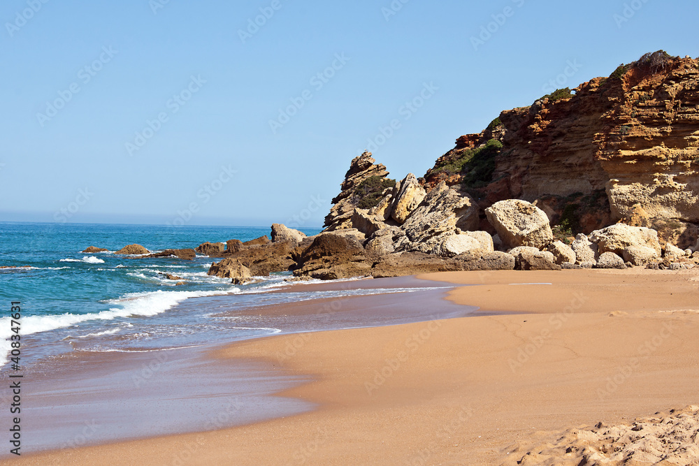 deserted beach on the Atlantic coast near Cadiz, Spain. deserted beach on the Atlantic coast near Cadiz, Spain.