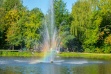 Rainbow In A Pond At The Vondelpark Park At Amsterdam The Netherlands
