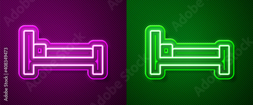 Glowing neon line Bed icon isolated on purple and green background. Vector.