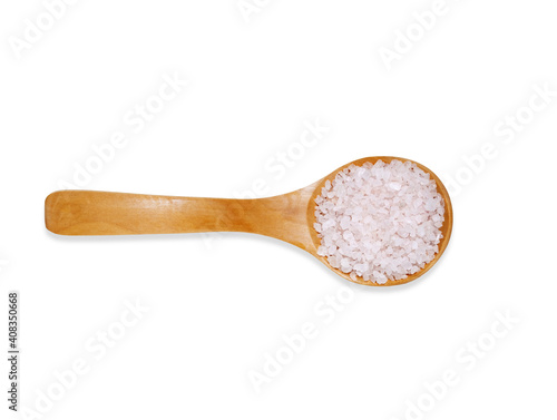 Top view  wooden spoon with white sea salt  isolated on a white background. Kitchen utensil and cooking ingredients template.