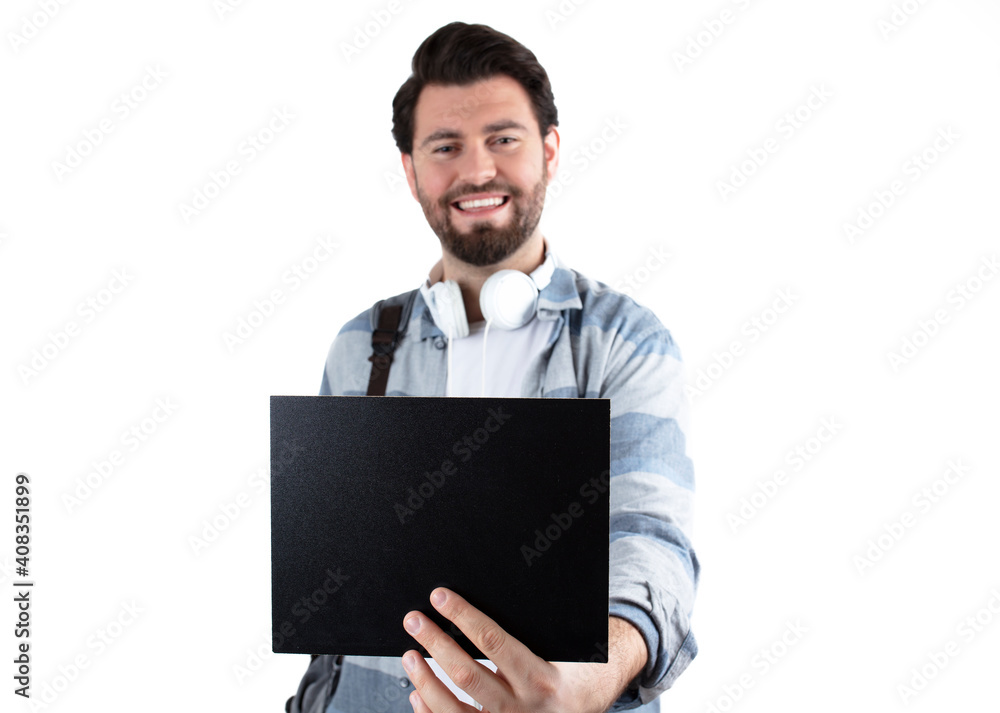 Young handsome student Man showing blank sign board over white background. Young handsome student Man showing blank sign board over white background.