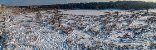 Wallpaper Mural aerial view of snowy winter landscape with forest and meandering brook Torontodigital.ca