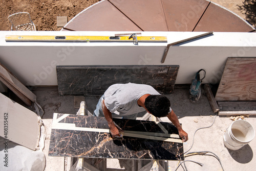 Stone cutter at work from above