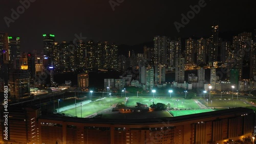 night time illuminated hong kong city famous sport stadium complex aerial panorama 4k  photo