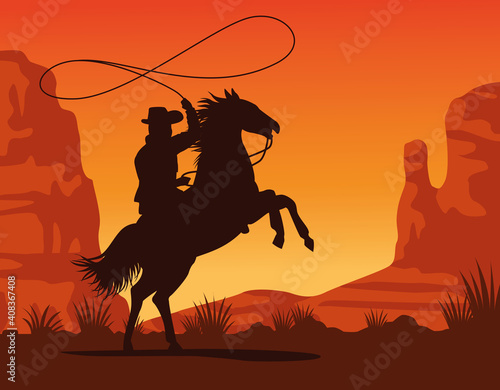 cowboy figure silhouette in horse lassoing sunset lansdscape scene