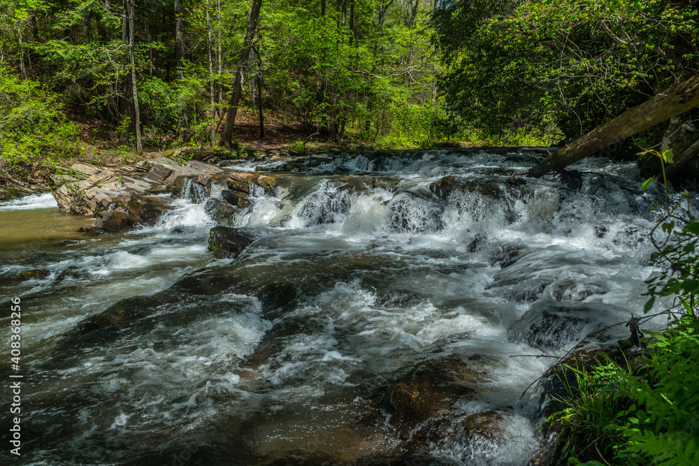 Fototapeta premium Whitewater rushing downstream