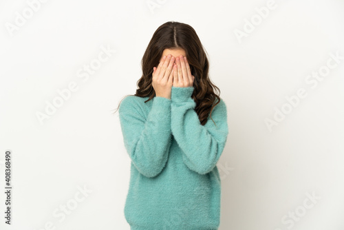 Little caucasian girl isolated on white background with tired and sick expression