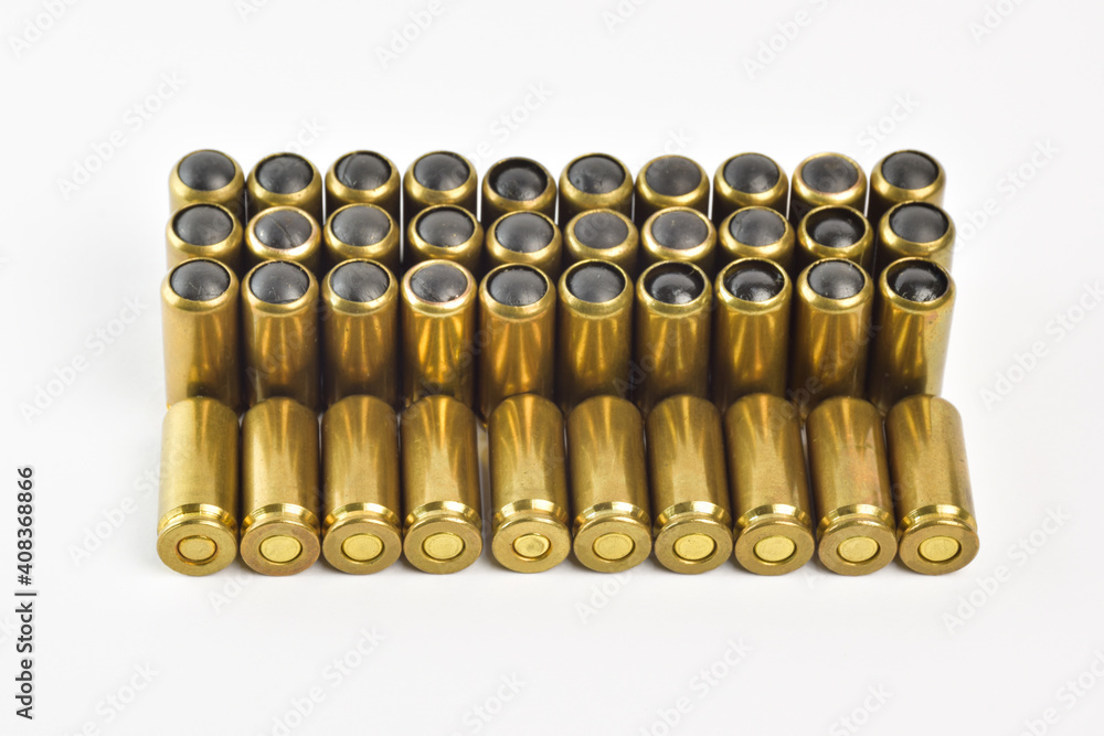 Equal rows of cartridges in the center of the frame on a white clipping background Equal rows of cartridges in the center of the frame on a white clipping background